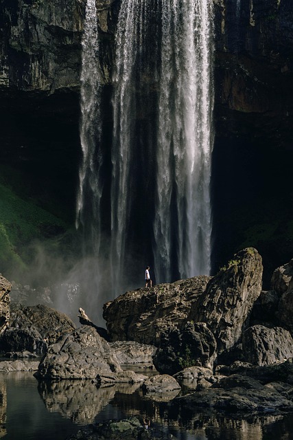 waterfall, rocks, trekking, phone wallpaper, cliff, man, hiker, travel, adventure, hiking, backpacking, falls, mountain, nature, aesthetic wallpaper, iphone wallpaper, black wallpaper, black - 4K 8K wallpaper background by leducchinh61900 | Pix8K
