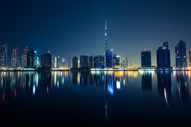 buildings, illuminated, water, waterfront, skyscrapers, skyline, city lights, cityscape, city view, nature, urban, urban landscape, metropolitan, dubai, city, lights, night, reflection, night photography - 4K 8K wallpaper background by Pexels | Pix8K